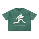 Runningman boxy tee in Forest, front, AW Fitness Club runner lockup with the Become the Gym tagline