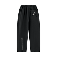 Runningman mineral wash sweatpants in Black, back, runner mark on the pocket and the I am the weight line up the left leg