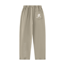 Runningman mineral wash sweatpants in Khaki, back, runner mark on the pocket and the I am the weight line up the left leg