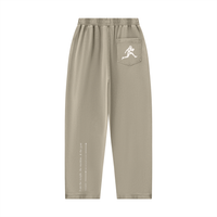 Runningman mineral wash sweatpants in Khaki, back, runner mark on the pocket and the I am the weight line up the left leg