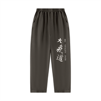 Runningman mineral wash sweatpants in Coffee, front, Dai Ki Do kanji with the Big Vitality Path translation down the right leg